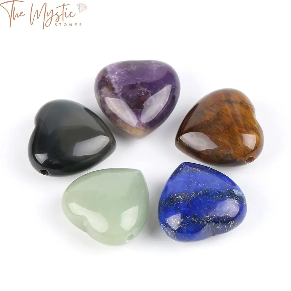 A collection of heart-shaped pendants made from various natural gemstones.