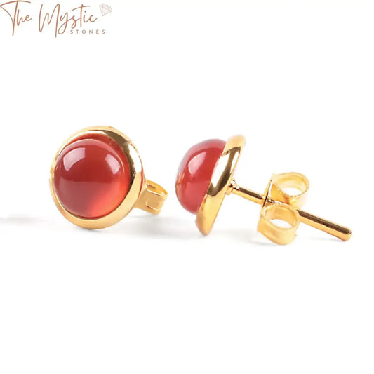 A pair of cute, tiny round stud earrings made of gold with natural gemstone beads.