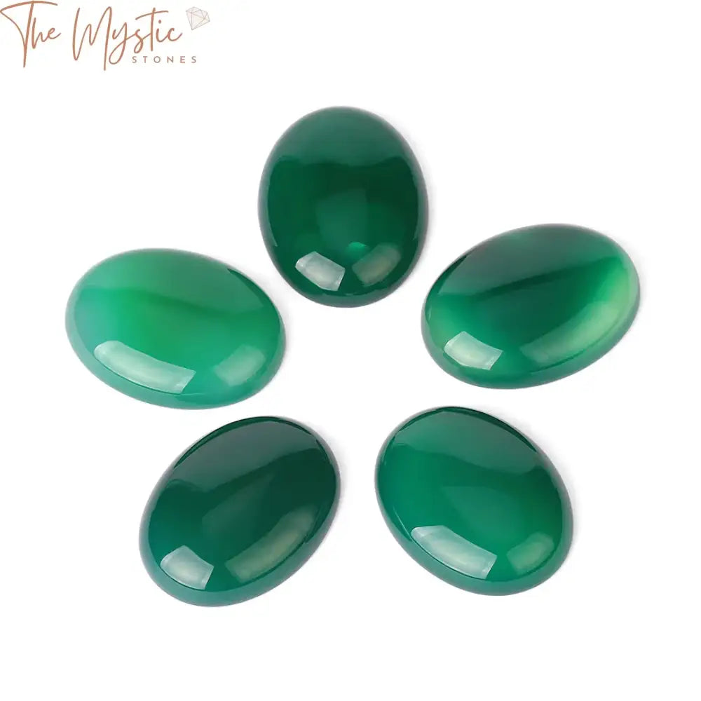 A close-up view of a 23x30mm oval green agate cabochon stone, with a smooth, polished surface and flat back.