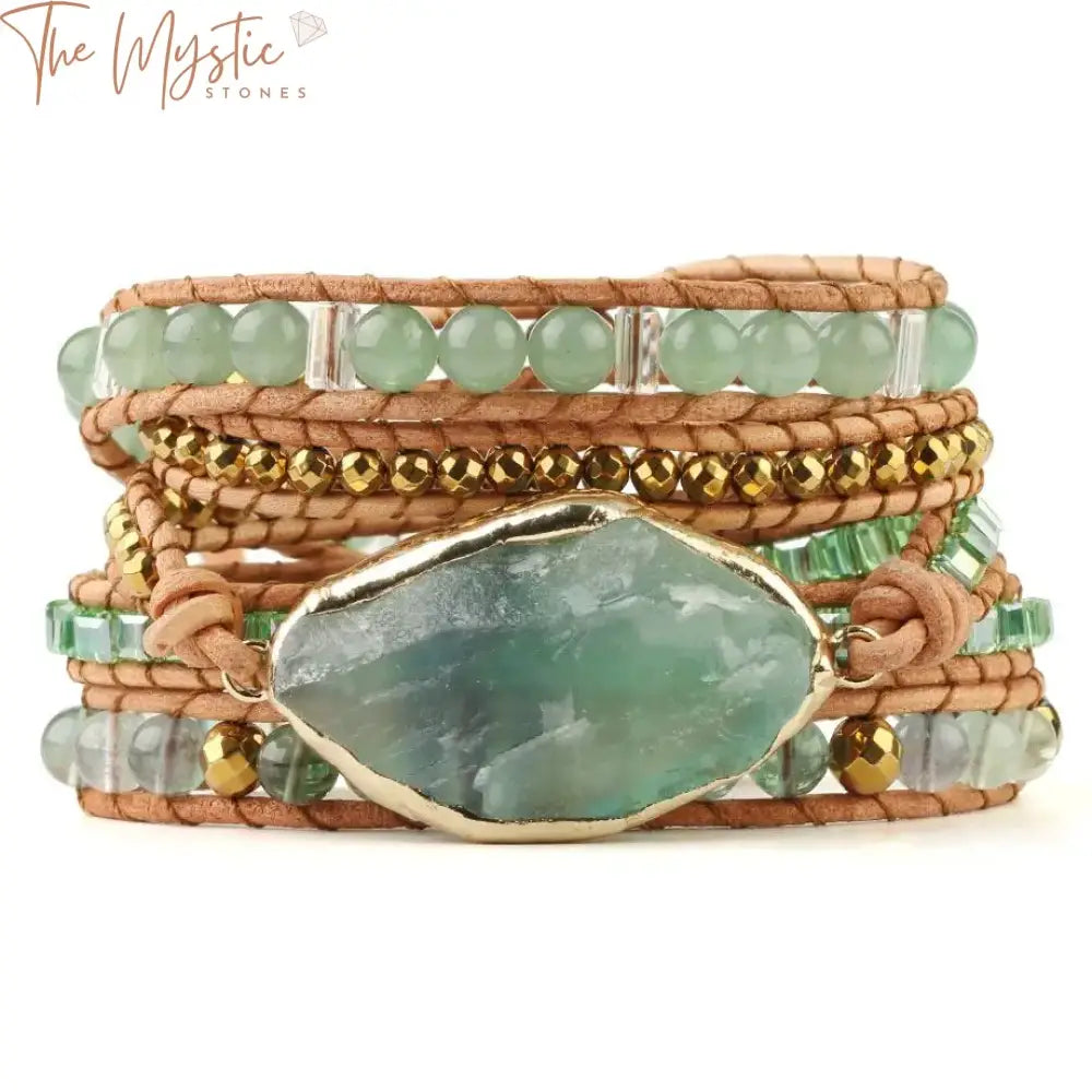 A braided bracelet featuring green aventurine beads is elegantly wrapped around itself.