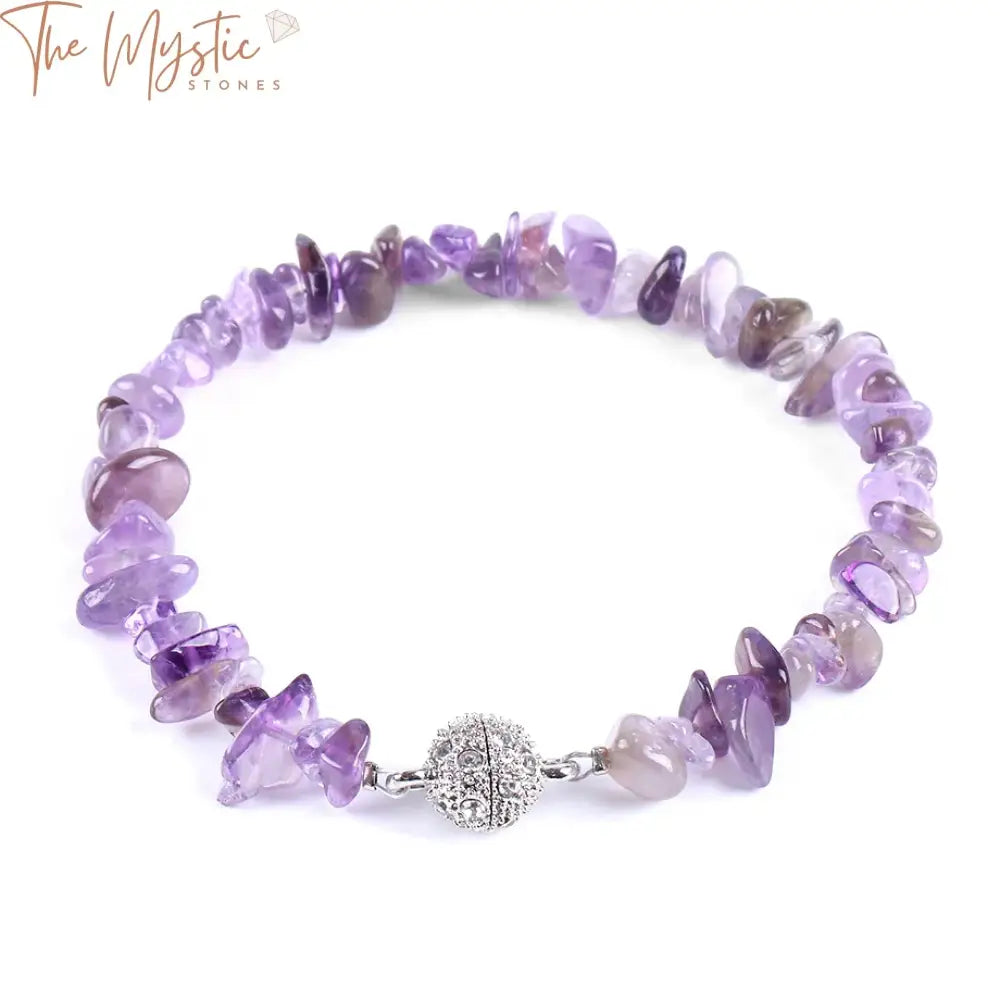 A collection of natural gravel gemstone bead bracelets displayed on a smooth surface.