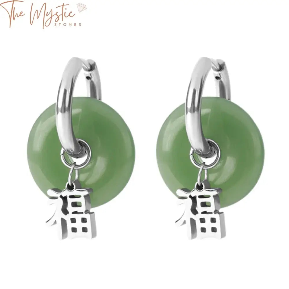 A close-up image of round hoop earrings made of green jade, designed for women.