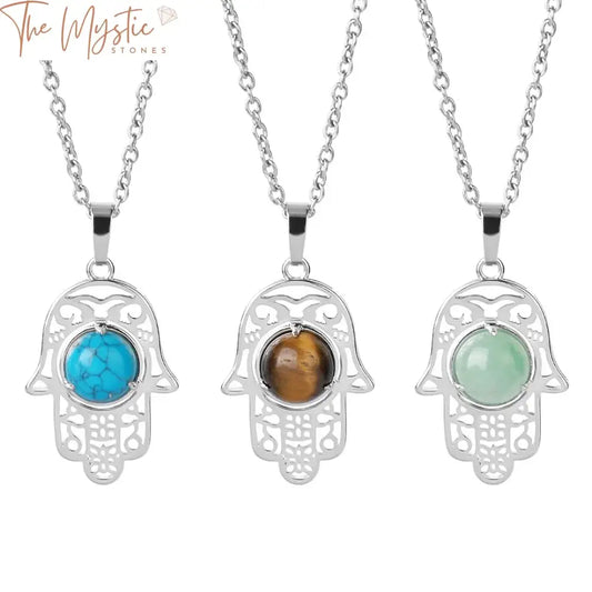 A finely crafted necklace featuring a Hamsa hand pendant adorned with intricate designs.