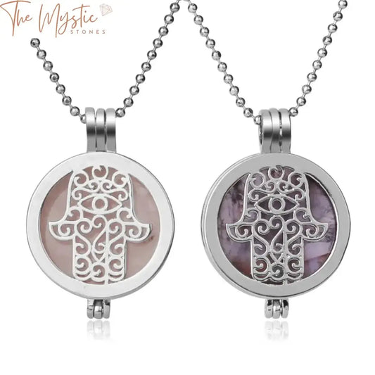 A collection of natural stone locket pendant necklaces featuring the Fatima Hamsa Hand design.