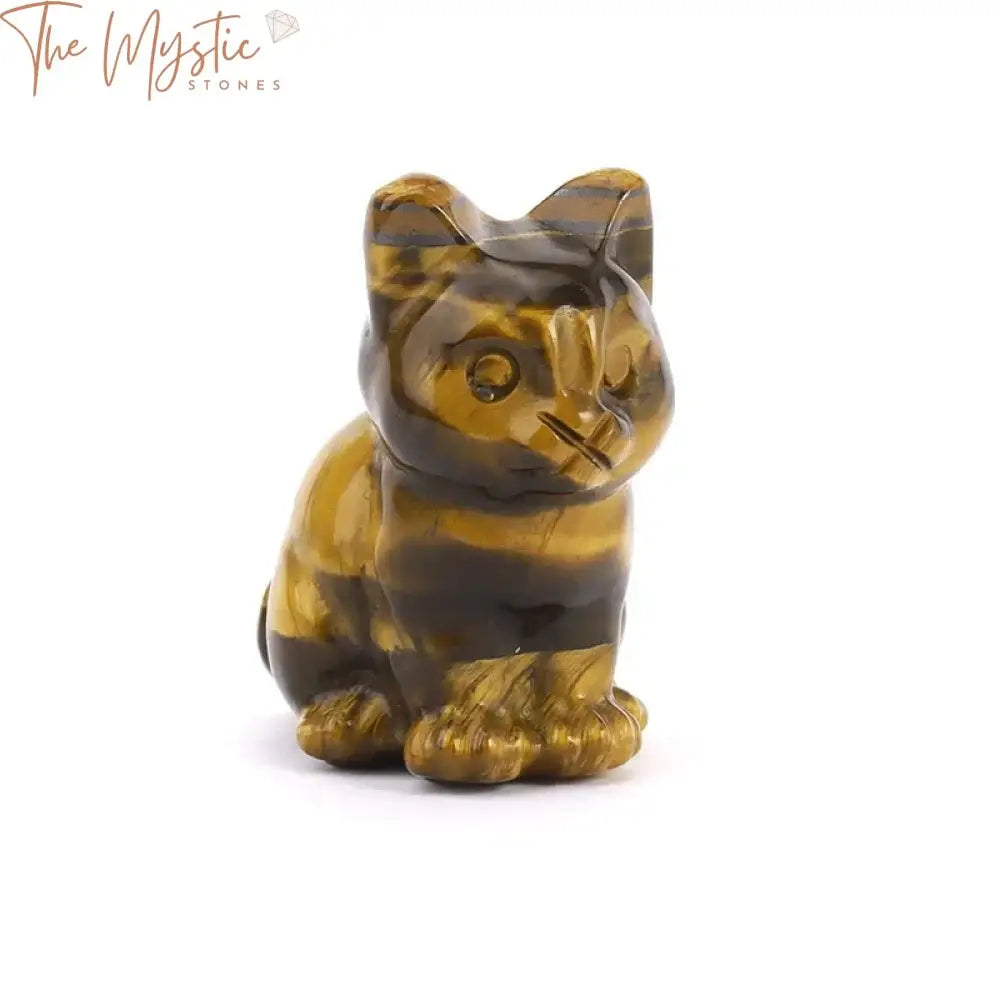 A collection of natural stone cat figurines displayed side by side, each intricately hand-carved.