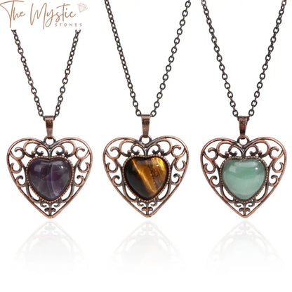 A heart-shaped pendant crafted from a polished Tiger Eye stone, exhibiting warm amber and golden hues.