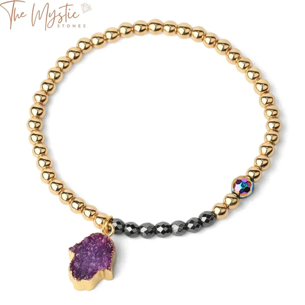 A bracelet featuring gold-color 4mm beads and a copper chain, adorned with energy-enhancing magnetic hematite stones.