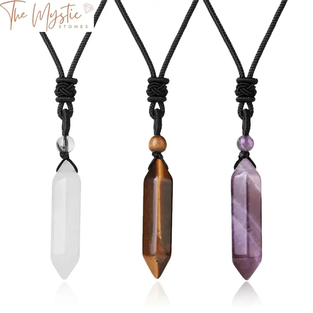 A handcrafted necklace featuring a polished hexagonal bullet-shaped pendant made from natural amethyst crystal.