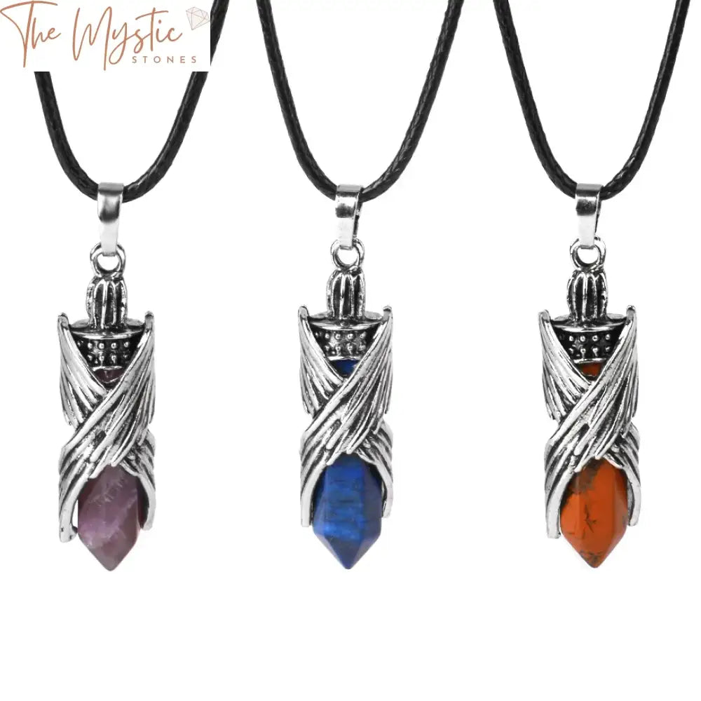 A collection of vintage hexagonal pendant necklaces made from natural stone, featuring angel wing and bullet designs.