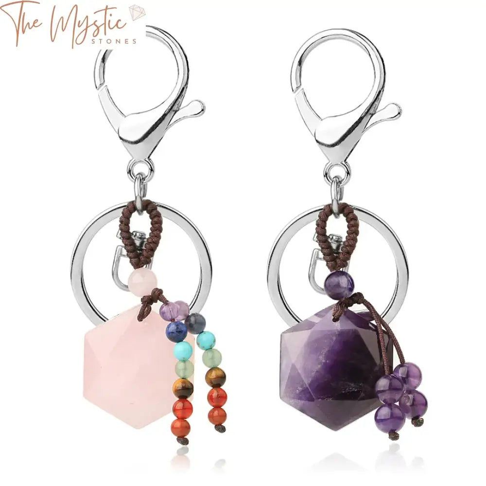 A collection of keychains featuring hexagram-shaped natural stones in various colors.