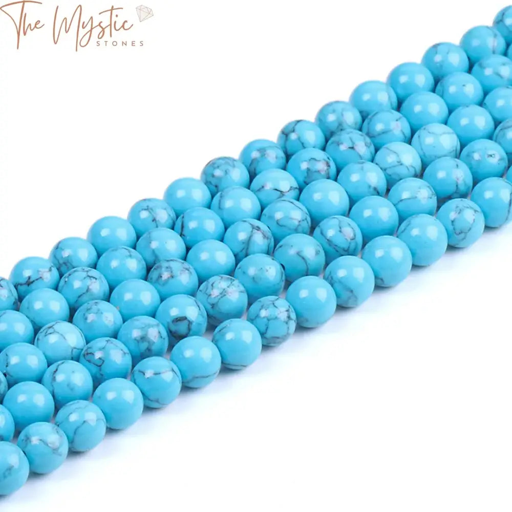 A collection of loose blue turquoise beads in varying sizes (4mm, 6mm, 8mm, 10mm) with a smooth finish, arranged neatly.