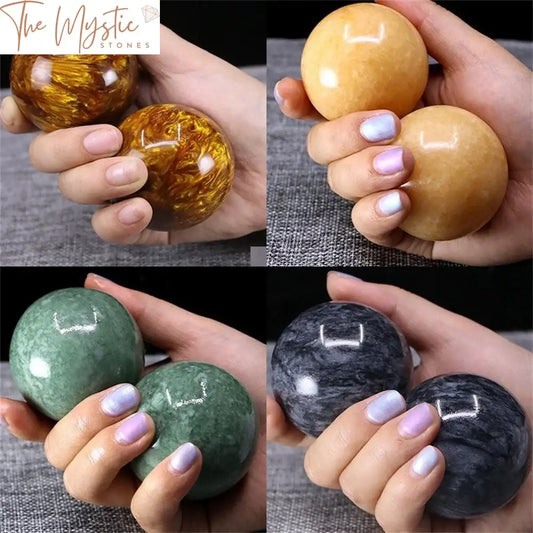 A pair of 50mm jade Baoding balls, smooth and spherical, displayed against a plain background.