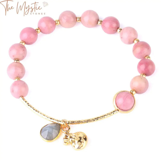 A bracelet featuring natural labradorite stones, arranged linearly with rhodonite accents and gold-colored spacer beads.