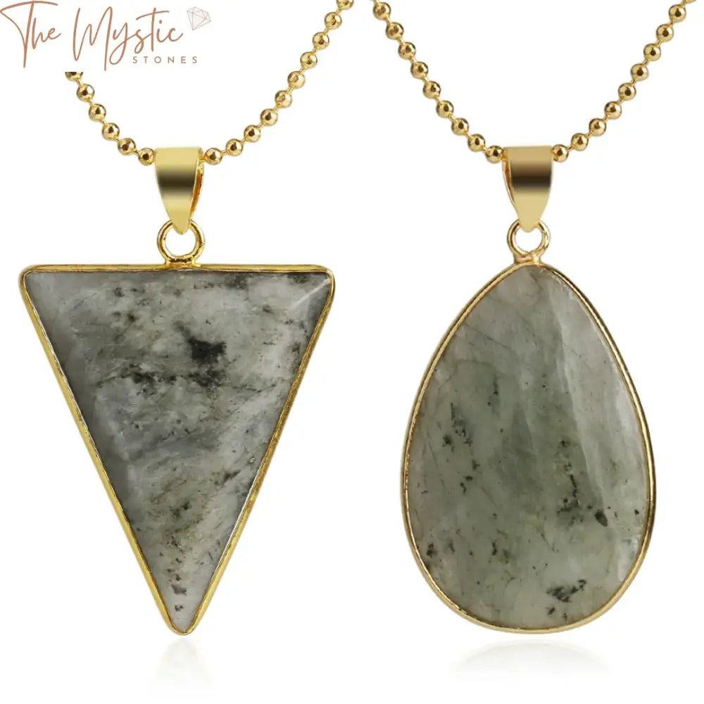 Three triangular pendants featuring spectrolite labradorite stones are displayed against a neutral background.