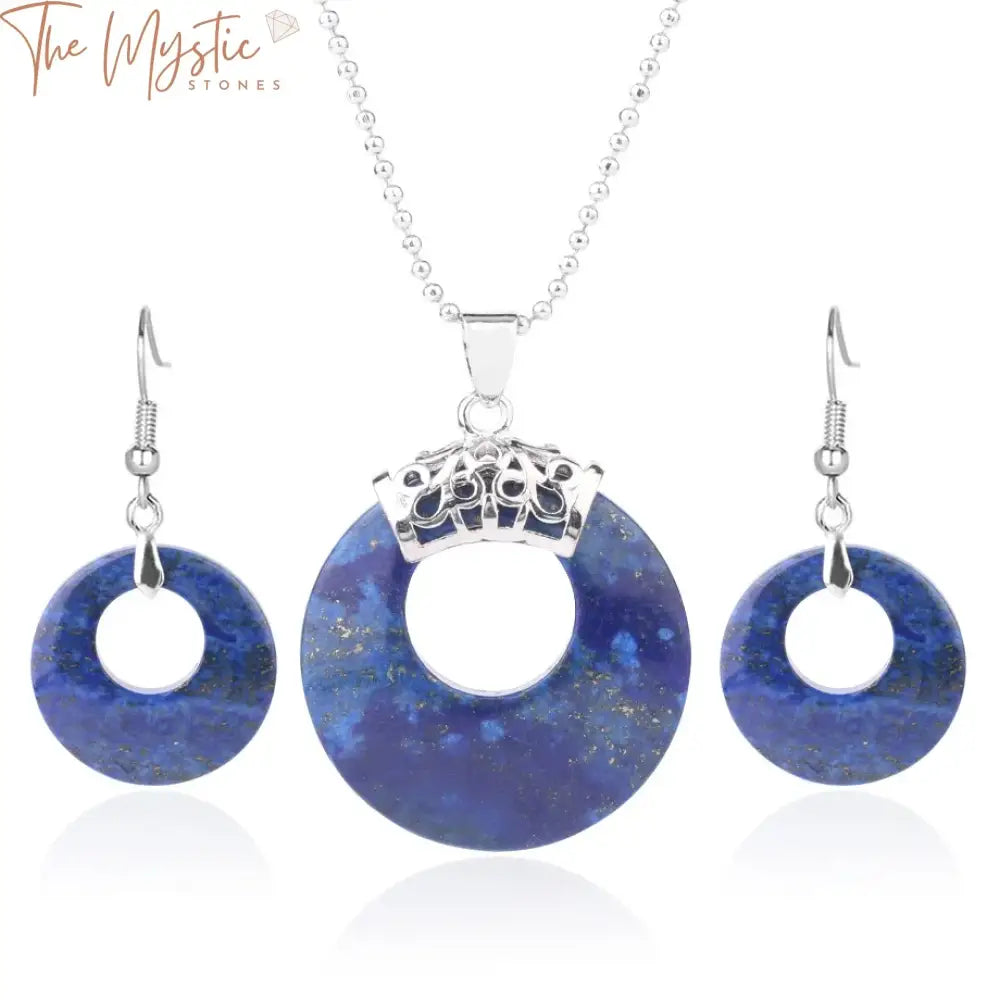 A jewelry set featuring a necklace and drop earrings made from natural lapis gemstones.