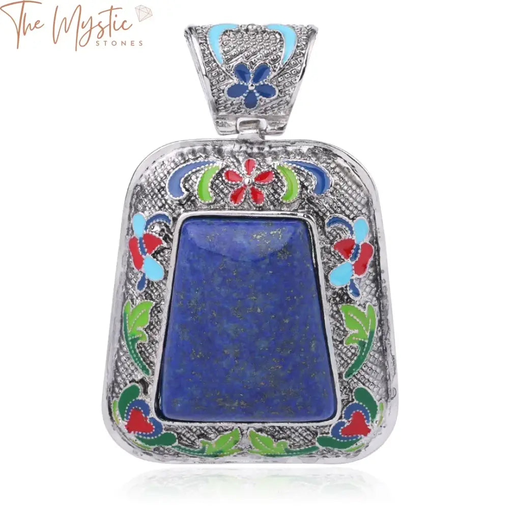 A large, deep blue Lapis Lazuli natural stone pendant with golden flecks, bound in a sleek silver-colored setting.