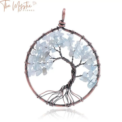 A handmade Tree of Life pendant featuring a network of wire branches elegantly wrapped around a circular frame.