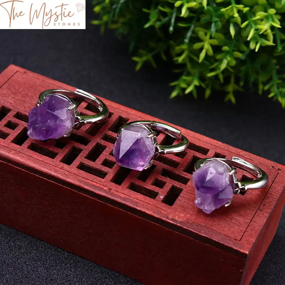 A beautifully crafted ring featuring a natural, raw, rough lavender amethyst gemstone set in an irregular shape.