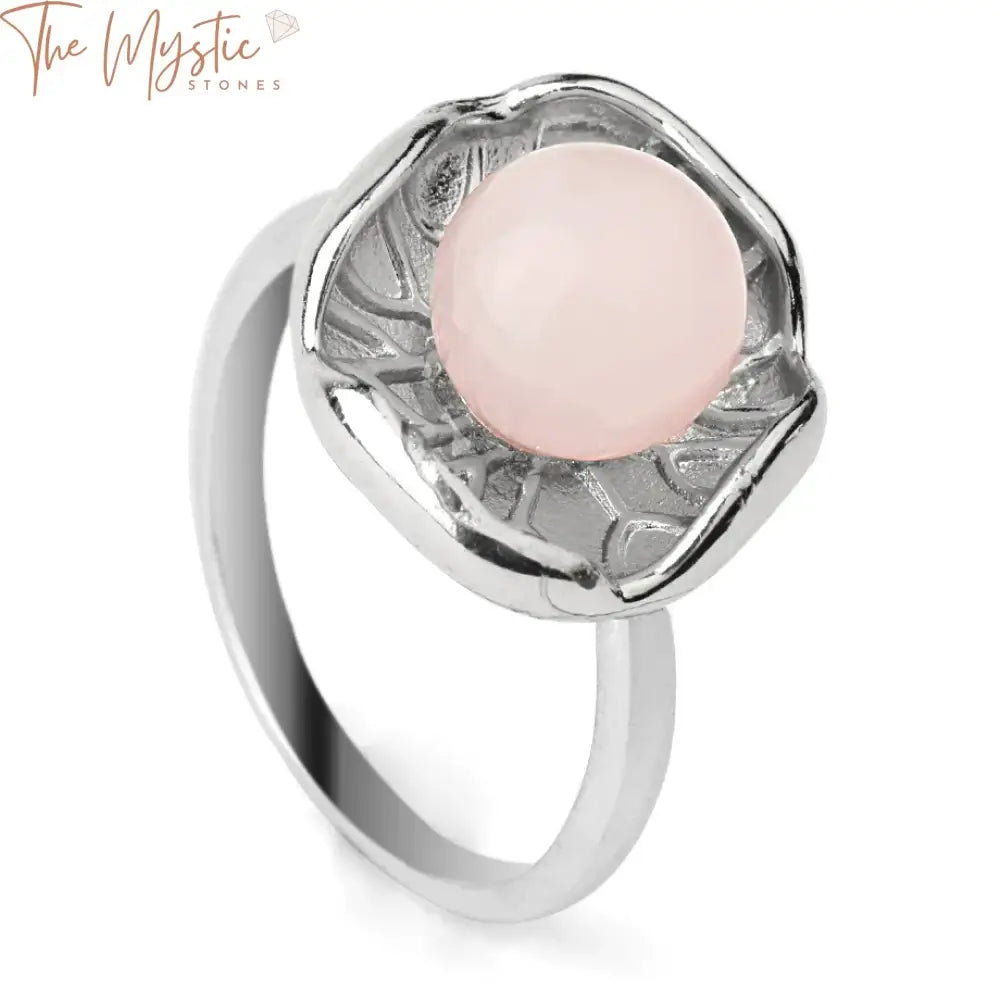 A silver-colored adjustable ring designed with a lotus leaf motif, set with a natural crystal stone.