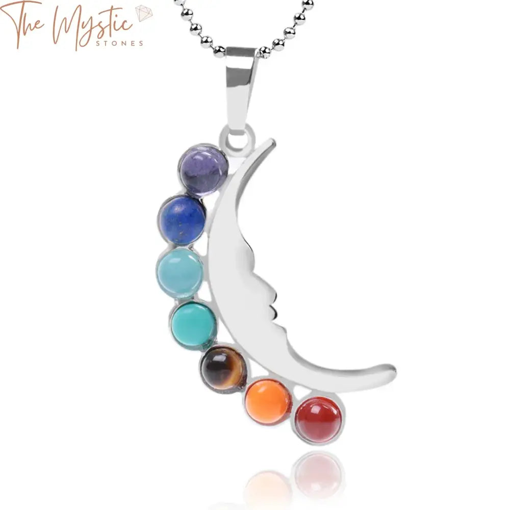 A collection of Tibetan Buddhism 7 Chakras necklaces and pendants featuring half-moon designs.