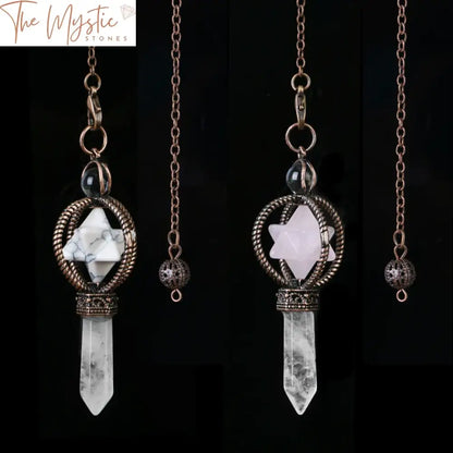 A collection of crystal pendulums displayed against a neutral background.