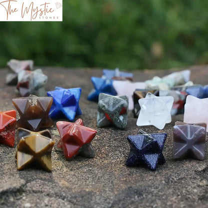 A single, intricately carved mini Merkaba star made from natural stone, displaying a mix of earthy tones and textures.