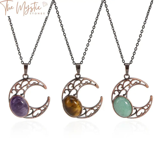 A vintage moon necklace featuring a natural stone egg pendant made of tiger eye and amethyst crystals.