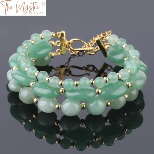 A multilayer bracelet featuring natural stone beads with an egg-shaped, oval flat design.