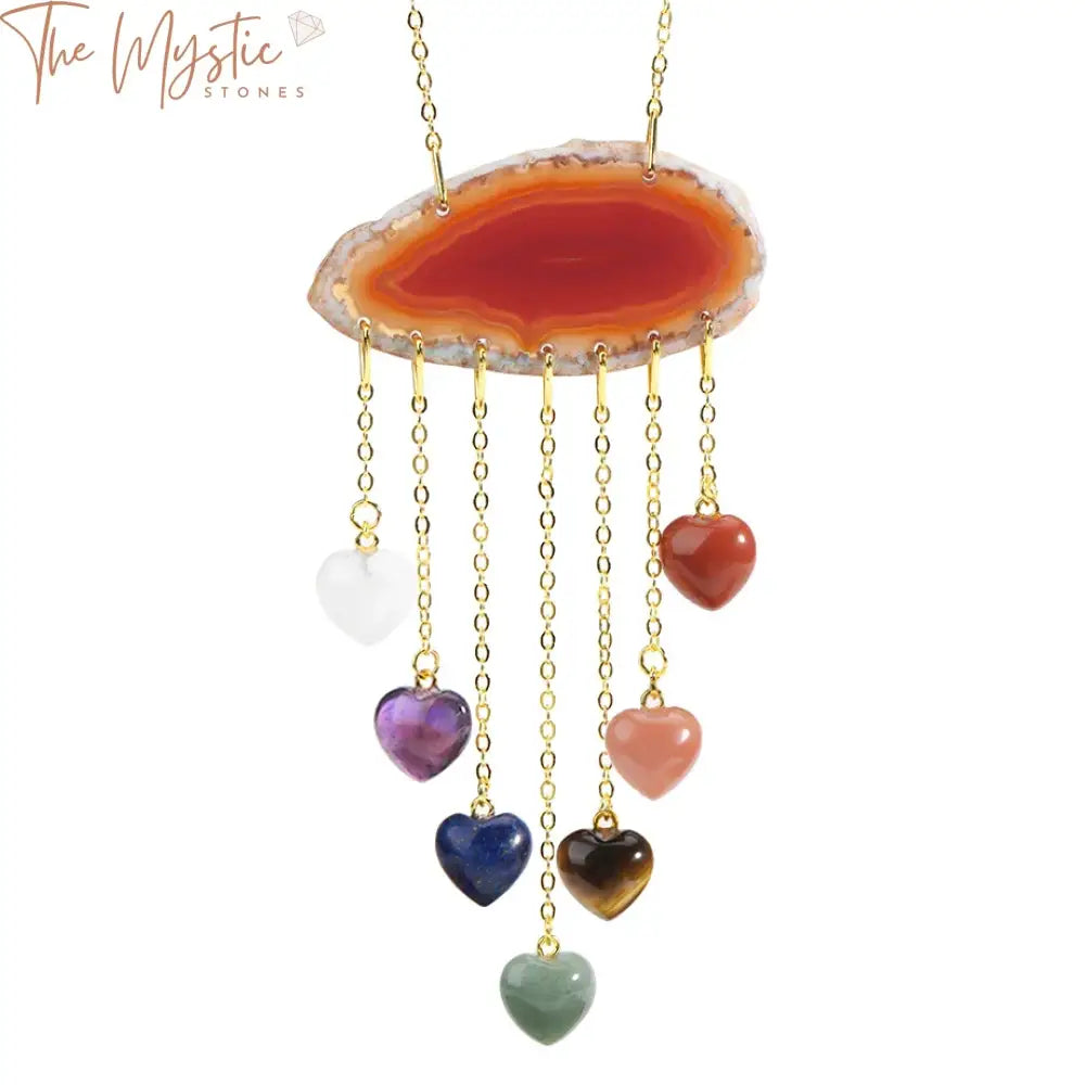 A hanging decor piece featuring a large, irregularly shaped natural agate stone pendant with vibrant banding.