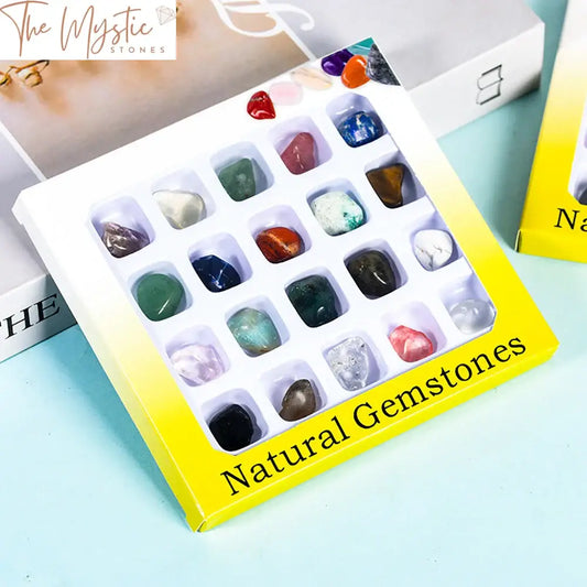 A collection of 20 assorted natural crystals and tumbled stones displayed on a black background.