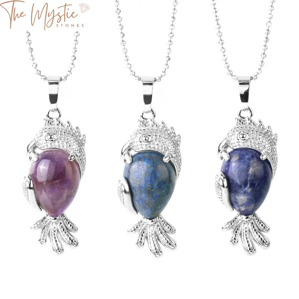 A collection of elegant necklaces featuring natural stone and crystal pendants in the shape of parrots.