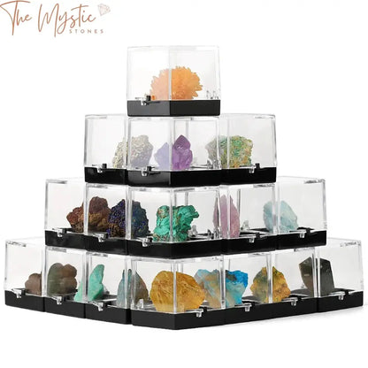 A display of various raw stone specimens featuring an assortment of natural minerals and irregularly shaped precious gems.