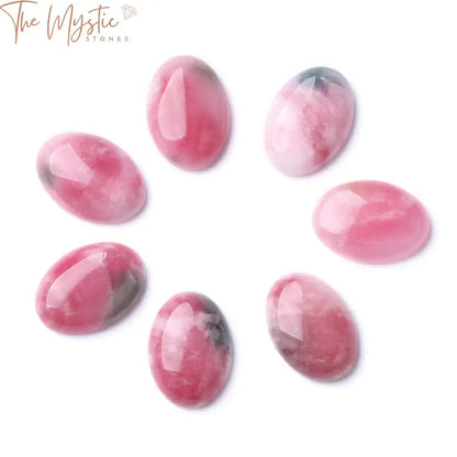 A variety of vibrant, natural loose semi-precious gemstone beads in different shapes and sizes, artistically arranged.