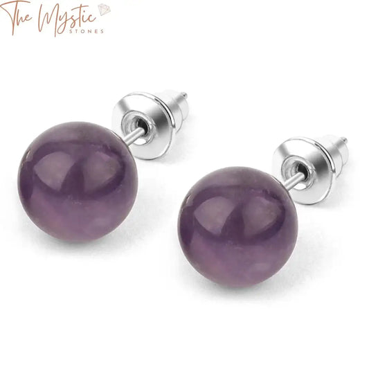 A pair of 8mm natural stone stud earrings featuring crystal quartz round ball beads with a smooth, polished surface.