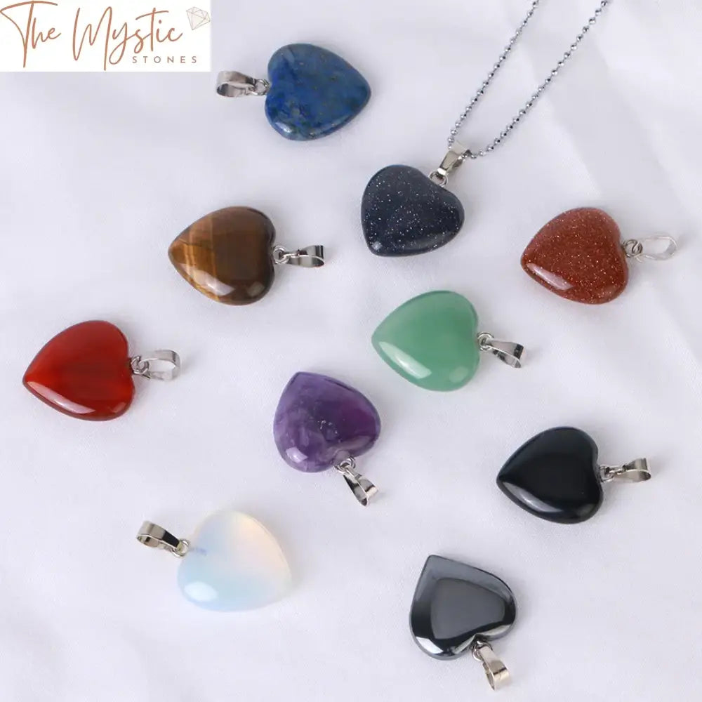 A collection of heart-shaped stone necklaces displayed on a white background.