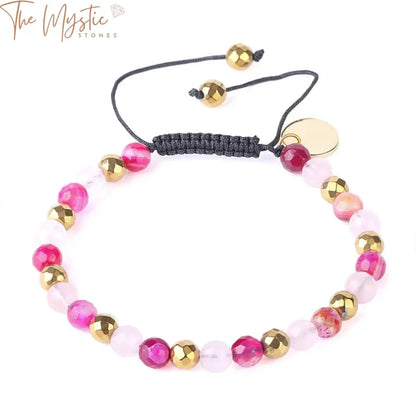 A multicolor bracelet featuring natural stone beads, including pink quartz and blue onyx.