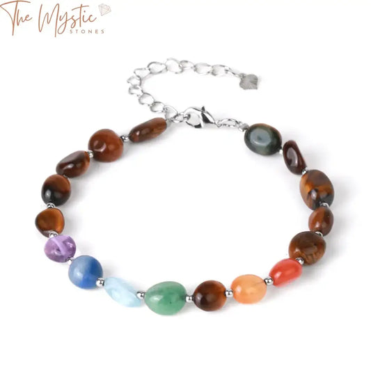 A close-up image of a Reiki 7 Chakras bracelet featuring irregularly shaped natural stones.