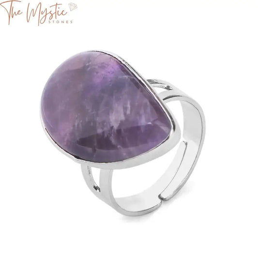 A collection of water drop-shaped rings featuring various natural stones including purple quartz, pink quartz, and tiger eye.