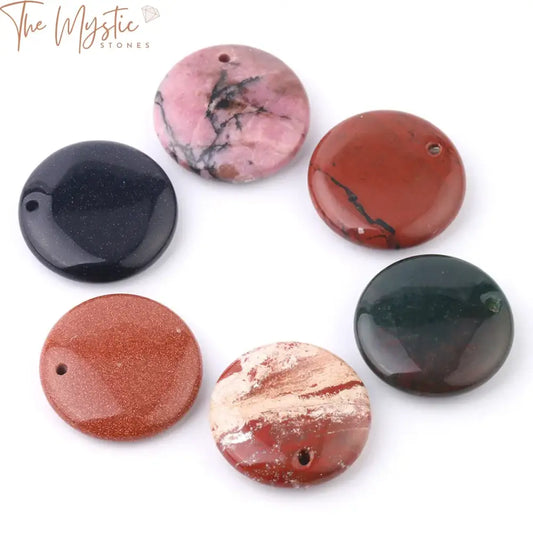 A close-up image of a selection of round, flat natural stone pendants, each measuring 26x26mm.