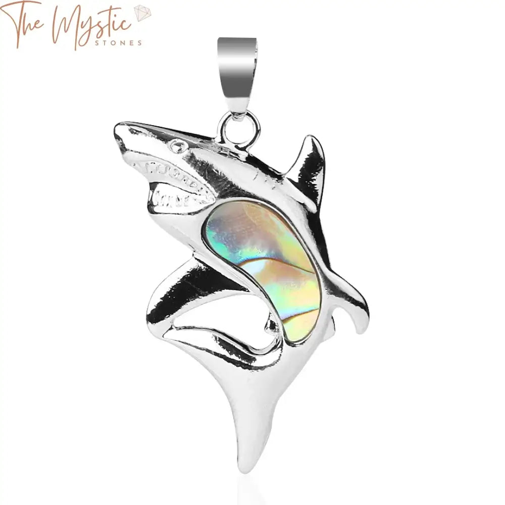 A close-up image of a pendant featuring a dolphin crafted from a New Zealand natural paua abalone shell.