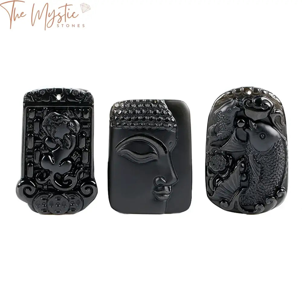 A round natural obsidian black pendant featuring a raw, hand-carved Buddha design.