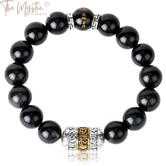 A bracelet featuring 12mm natural obsidian stone beads, strung together on an elastic band.