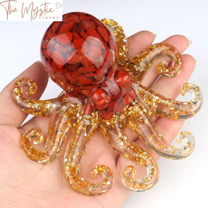 A detailed view of a handmade octopus figurine crafted from natural crystal stone and epoxy resin.