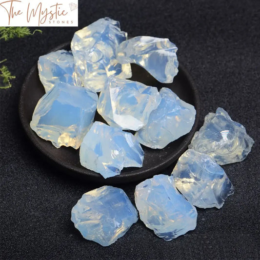 A collection of natural opal rough stones and quartz crystals showcasing various sizes and shapes.