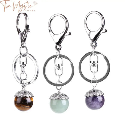 A collection of elegant keychains featuring a variety of natural stone pendants.