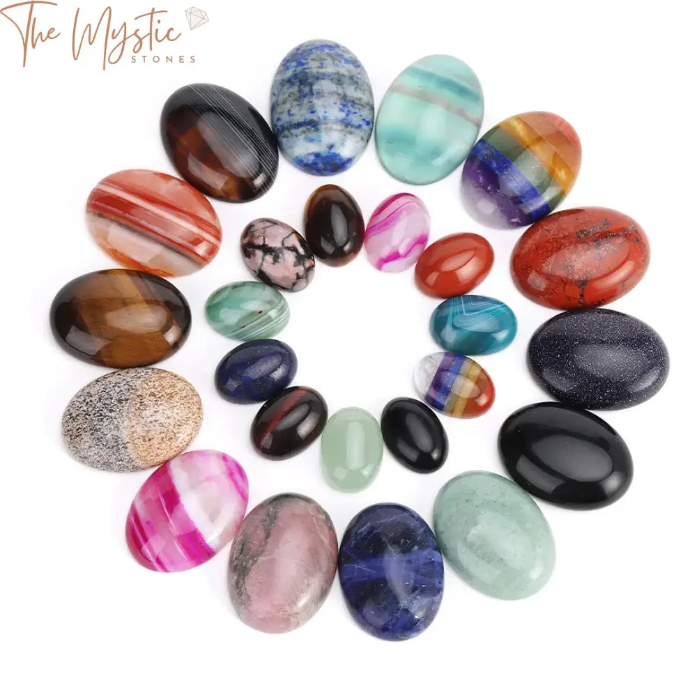 Five oval-shaped crystal cabochons of varying sizes arranged in a row.