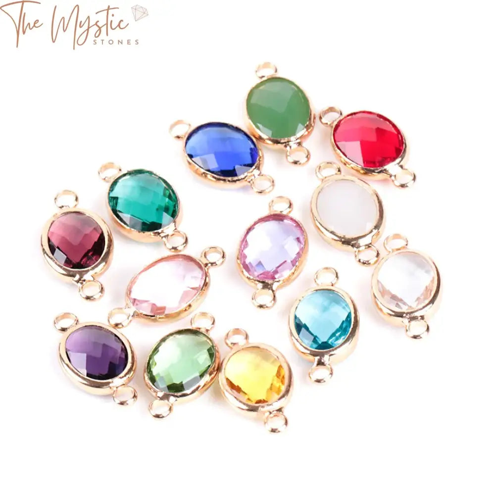 A set of 10 oval-shaped glass crystal beads in various shades, displaying a sparkling and translucent appearance.