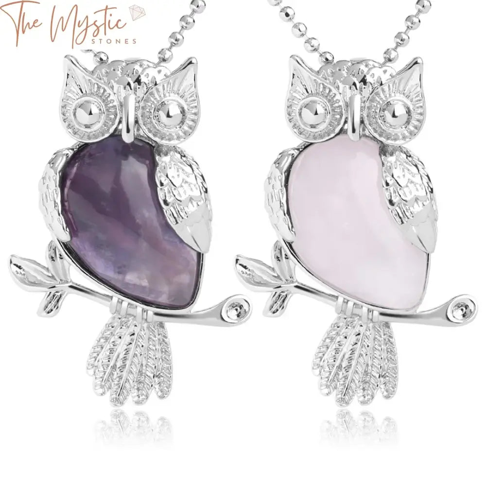 An owl-shaped pendant crafted from pink quartz and sodalite crystal hangs elegantly from a delicate chain.