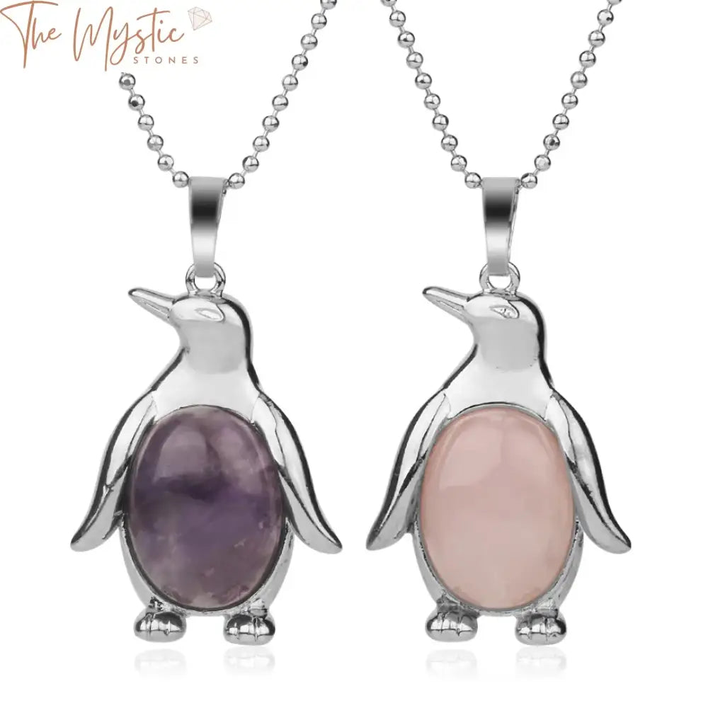 A photo showcasing a Reiki Penguin Pendant Necklace featuring a natural crystal stone.