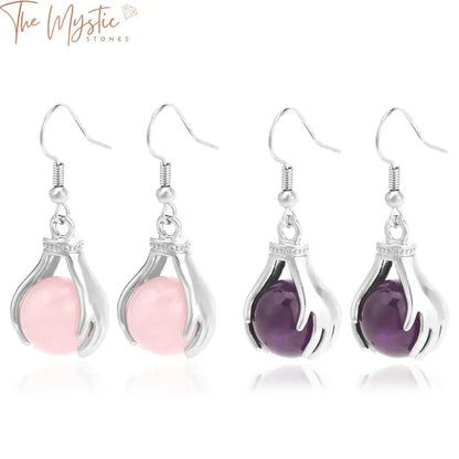 A pair of elegant, round bead crystal dangle earrings featuring natural pink amethyst quartz stones.